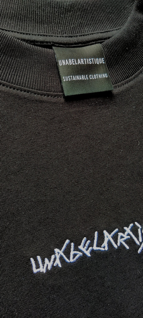 Zwart: T-shirt met Unabelartistique-logo