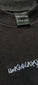 Zwart: T-shirt met Unabelartistique-logo
